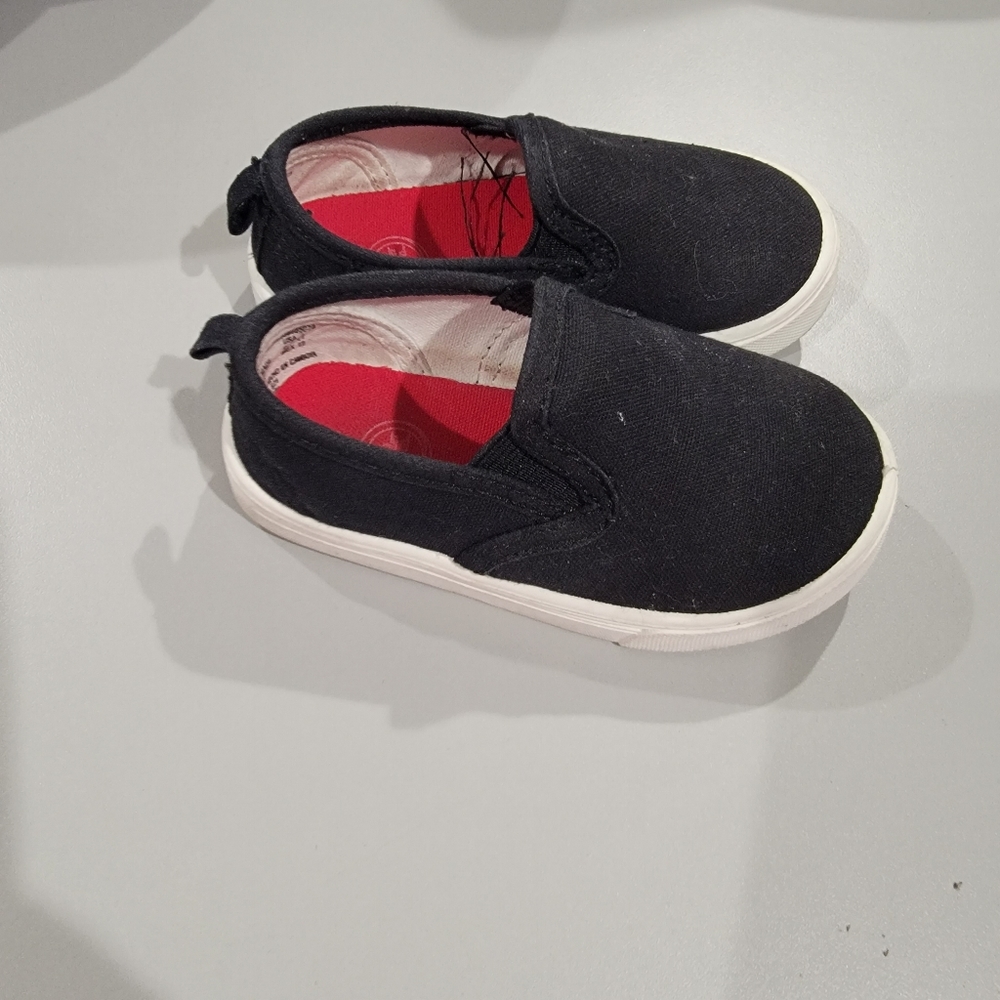 Black slip on sneakers